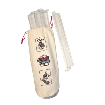 An image of 4 clear acrylic mahjong tile and pusher racks and a canvas Mahj Queen™ bag.
