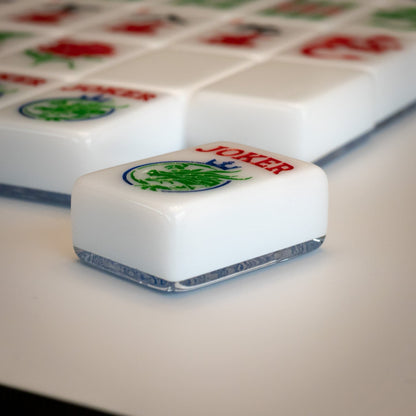 An angled shot of tiles from the Modern Classic mahjong tile line from Mahj Queen™ to show the side view of the set.