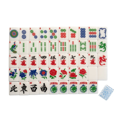 A top down image of the Modern Classic American Mahjong tiles from Mahj Queen™.  This set features modernized designs for easier identification—with classic red, green and blue ink coloring.