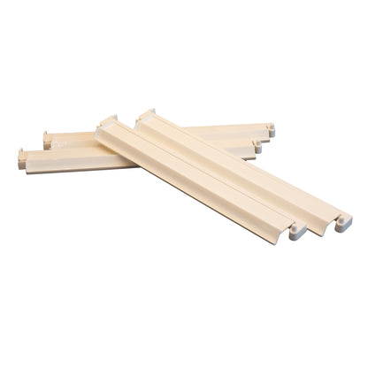 An image of 4 white acrylic mahjong tile pusher racks.